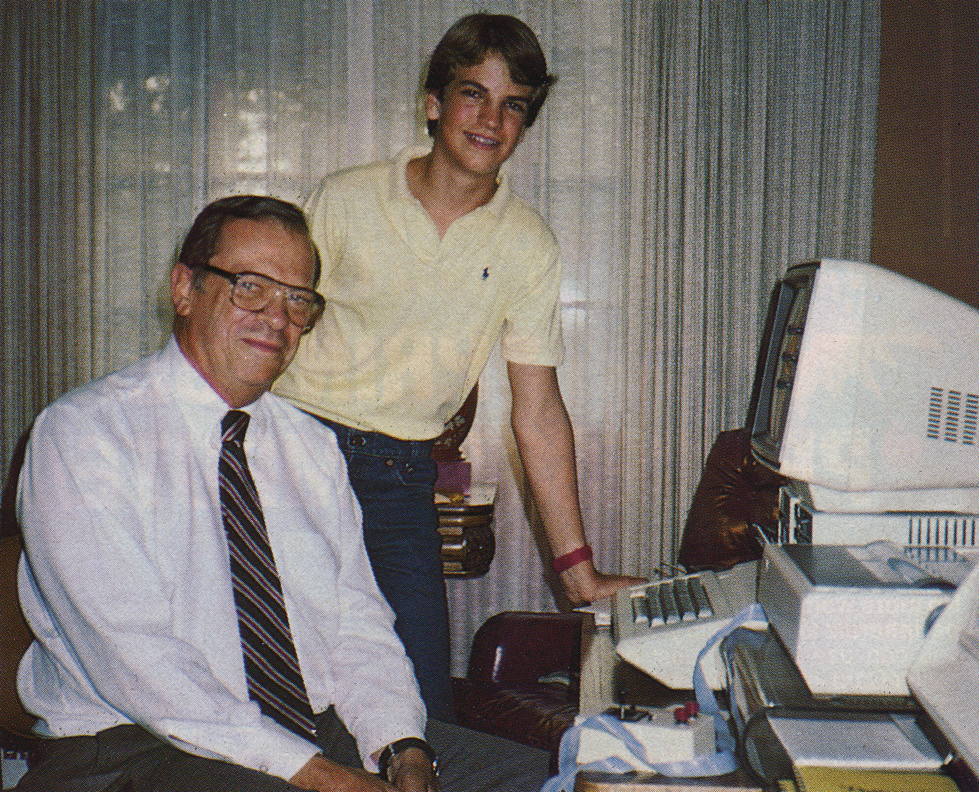 Above, Dr. Allen E. Puckett, Hughes Aircraft chairman, and his son Jimmy enjoy spending time at their computer workstation at home.