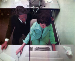 Employees of Hughes Aircraft learn about Lisa at Apple’s district office in Culver City, California. The instructors are sales training specialists Sarah Schwartz and national account executive Wayne Norberg, who represents the Hughes account.