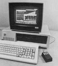 Prototype of Visicorp’s Visi On integrated applications environment. Note the multiple video windows and mouse. Since this photo was taken, Visicorp has changed to a two-button mouse.