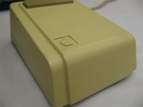 Apple Lisa mouse – embossed Apple logo. 